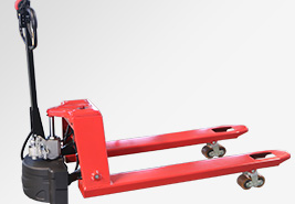 The factory warehouse uses electric material handling vehicles to load and unload goods